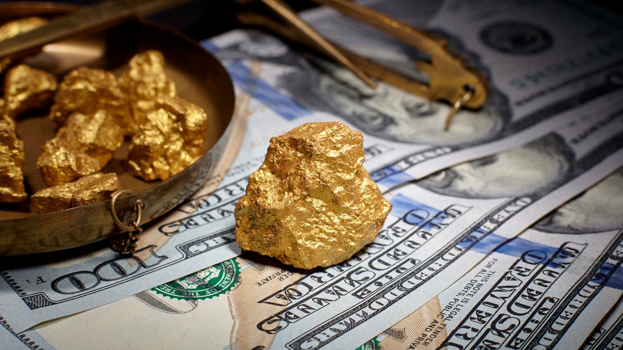 Le record historique de l'or est un signe de remise en question sur le dollar américain